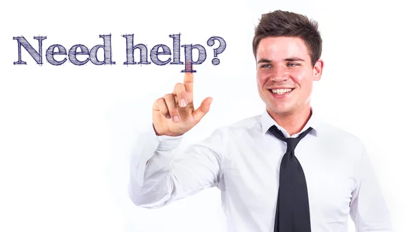 Need help? - Young smiling businessman touching text — Stock Photo, Image