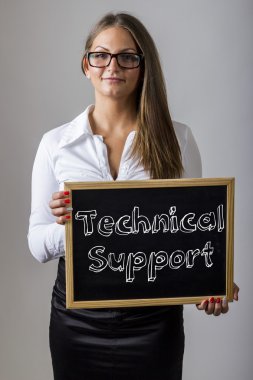 Technical Support - Young businesswoman holding chalkboard with 