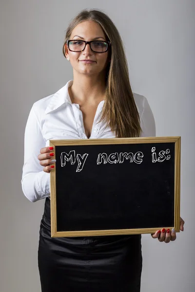 My name is: - Young businesswoman holding chalkboard with text — Stok fotoğraf