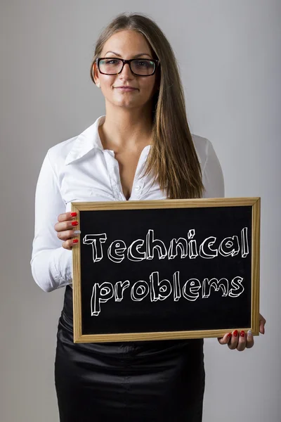 Technical problems - Young businesswoman holding chalkboard with — ストック写真