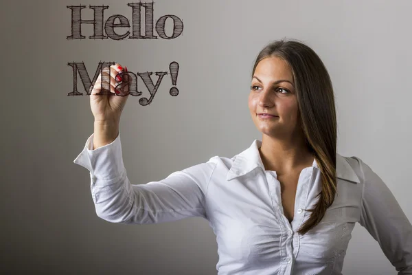 ¡Hola May! - Hermosa chica escribiendo en la superficie transparente —  Fotos de Stock