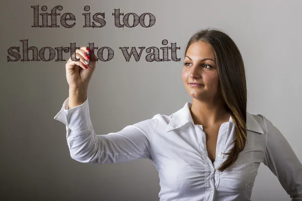 Life is too Short to Wait - Beautiful girl writing on transparen — Stock Photo, Image