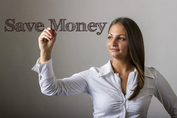 Ušetřit peníze - krásná dívka, psaní na transparentní povrchu — Stock fotografie