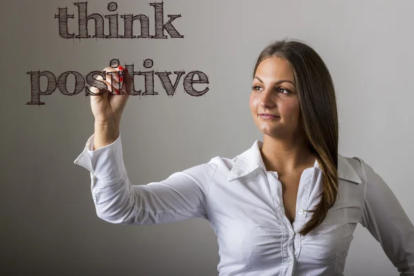 Pense positivo - Menina bonita escrevendo na superfície transparente — Fotografia de Stock