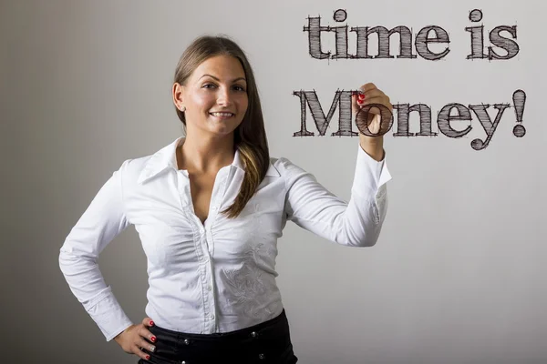 Tijd is geld! -Mooi meisje schrijven op transparante oppervlak — Stockfoto