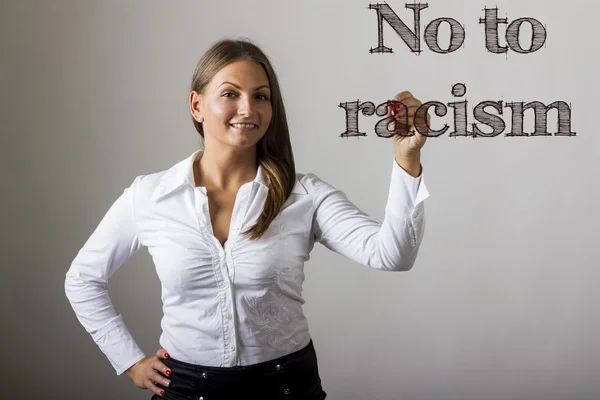 No to racism - Beautiful girl writing on transparent surface — Stock Photo, Image