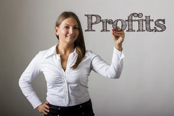 Profits - Beautiful girl writing on transparent surface — Stok fotoğraf