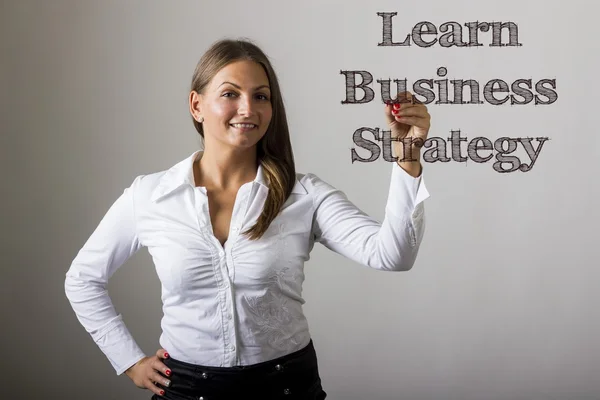 Learn Business Strategy - Beautiful girl writing on transparent — Zdjęcie stockowe