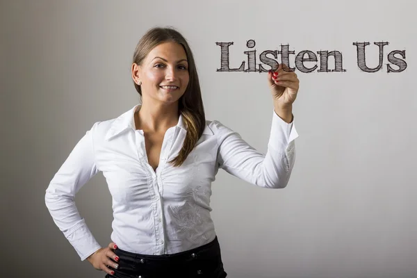 Escúchanos - Hermosa chica escribiendo en superficie transparente — Foto de Stock