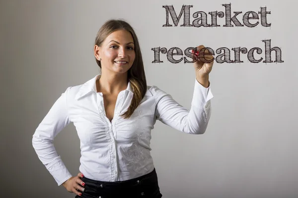 Market research - Beautiful girl writing on transparent surface — Stock Photo, Image