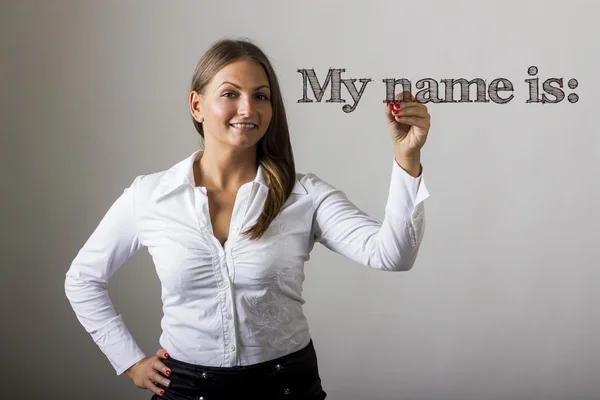 My name is: - Beautiful girl writing on transparent surface — Stock Photo, Image