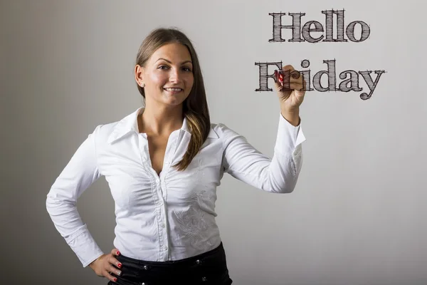 Hola viernes - Hermosa chica escribiendo en la superficie transparente — Foto de Stock