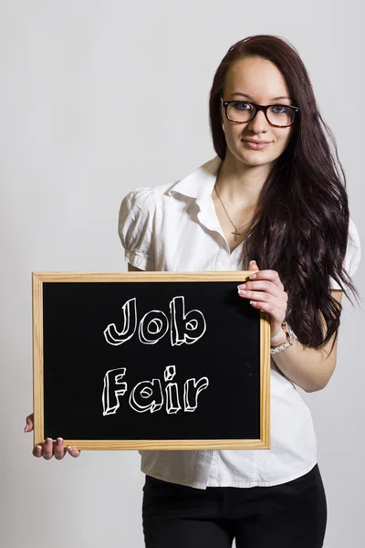 Job Fair  - Young businesswoman holding chalkboard — Stock Photo, Image