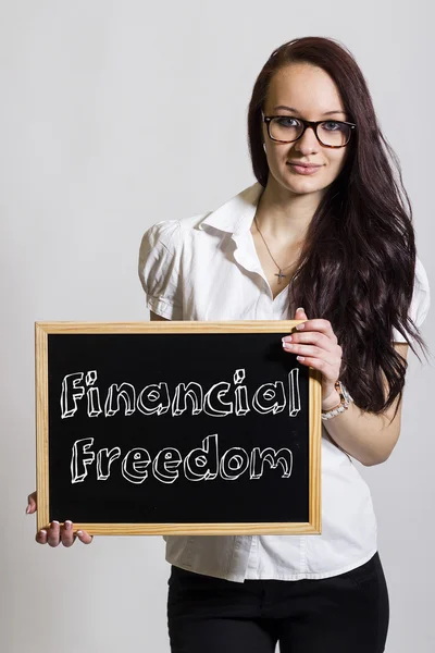 Liberdade financeira - Jovem empresária segurando quadro — Fotografia de Stock