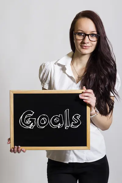 Cíle - mladá podnikatelka drží tabuli — Stock fotografie