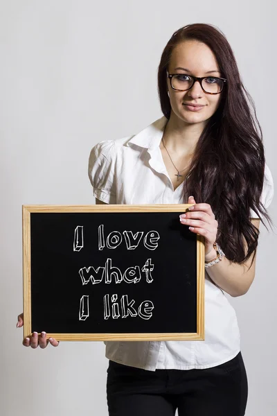 Mám rád to, co se mi líbí - mladá podnikatelka drží tabuli — Stock fotografie