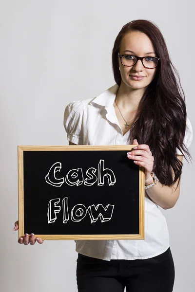 Cashflow - mladá podnikatelka drží tabuli — Stock fotografie