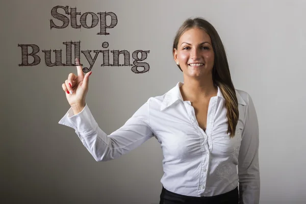 Stop Bullying - Menina bonita tocando texto no surf transparente — Fotografia de Stock