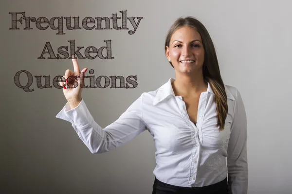 Frequently Asked Questions - Beautiful girl touching text on tra — Stock Photo, Image