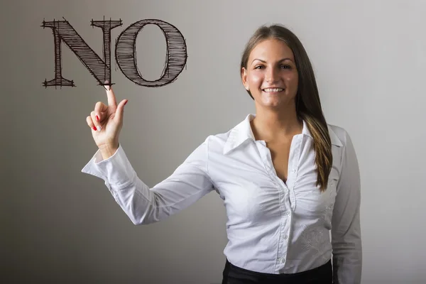 NO - Hermosa chica tocando el texto en la superficie transparente — Foto de Stock