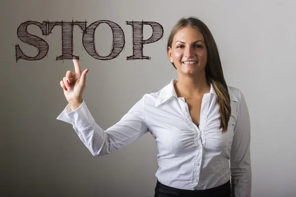 STOP - Hermosa chica tocando el texto en la superficie transparente —  Fotos de Stock