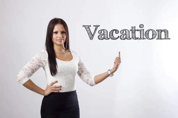 Vacation - Beautiful businesswoman pointing — Stock Photo, Image