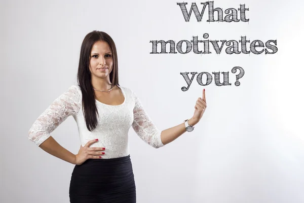 Was motiviert Sie? - schöne Geschäftsfrau zeigt — Stockfoto