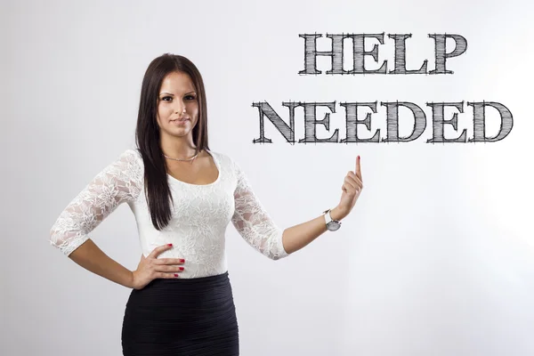 Hjälp behövs - vacker affärskvinna pekar — Stockfoto
