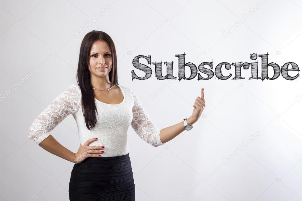 Subscribe - Beautiful businesswoman pointing