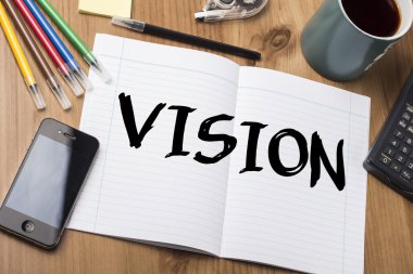 Vizyon - Not Defteri ile ahşap masa üzerinde metin