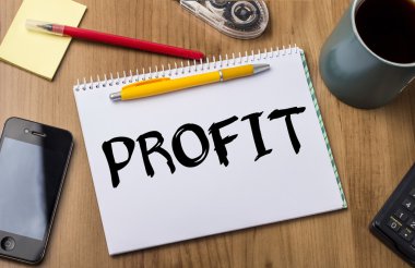 Kar - Not Defteri ile ahşap masa üzerinde metin