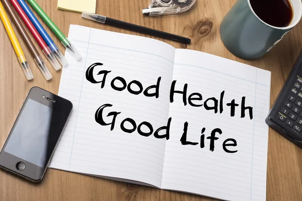 Goede gezondheid - Good Life - notitie Pad met tekst op houten tafel — Stockfoto