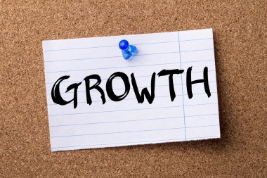 Büyüme - kalçası not kağıdı bulletin board tutturulmuş.