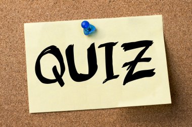 Quiz - yapışkanlı etiket bulletin board tutturulmuş.