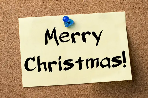 Merry Christmas! - adhesive label pinned on bulletin board — Stock Photo, Image