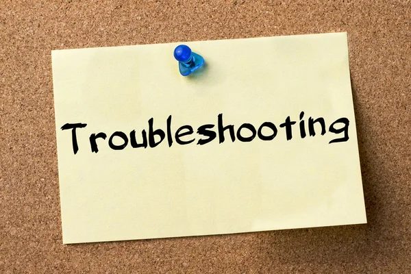 Troubleshooting - adhesive label pinned on bulletin board — Stock Photo, Image