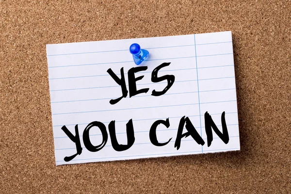 YES YOU CAN - teared note paper  pinned on bulletin board — Stock Photo, Image
