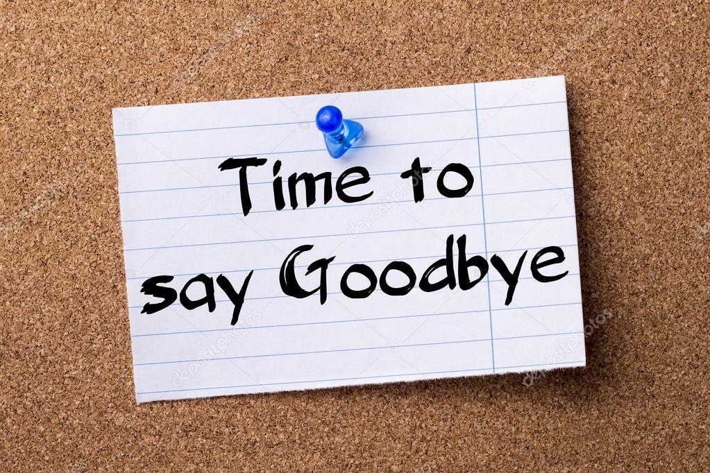 Time to say Goodbye - teared note paper  pinned on bulletin boar