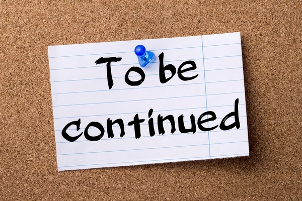 To be continued - teared note paper pinned on bulletin board