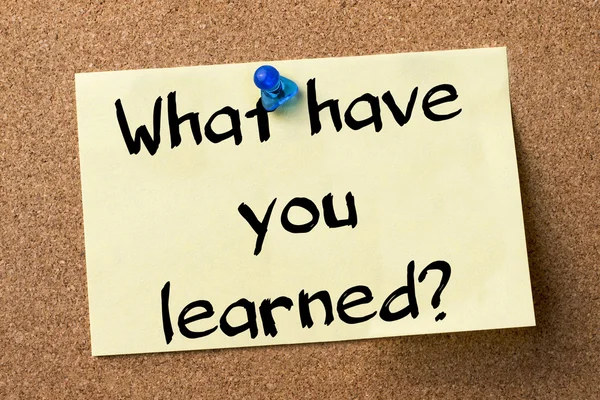 What have you learned? - adhesive label pinned on bulletin board