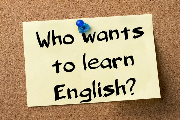 Who wants to learn English? - adhesive label pinned on bulletin — Stockfoto