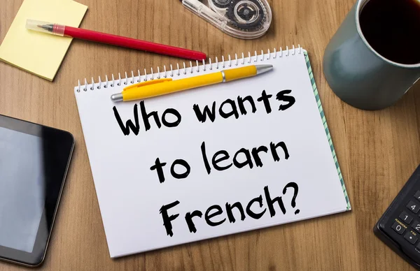¿Quién quiere aprender francés? - Bloc de notas con texto —  Fotos de Stock