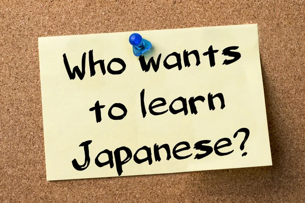 ¿Quién quiere aprender japonés? - etiqueta adhesiva fijada en el boletín —  Fotos de Stock