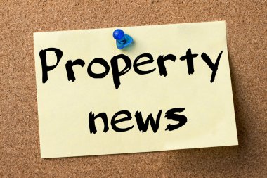 Emlak Haberleri - yapışkanlı etiket bulletin board tutturulmuş.