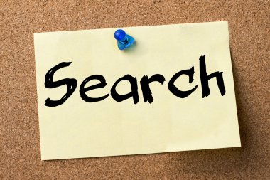 Arama - yapışkanlı etiket bulletin board tutturulmuş.