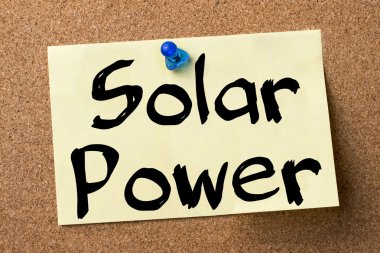 Güneş enerjisi - yapışkanlı etiket bulletin board tutturulmuş.