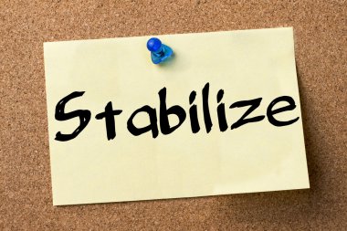Stabilize - yapışkanlı etiket bulletin board tutturulmuş