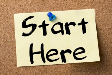 Başlat burada - yapışkanlı etiket bulletin board tutturulmuş.