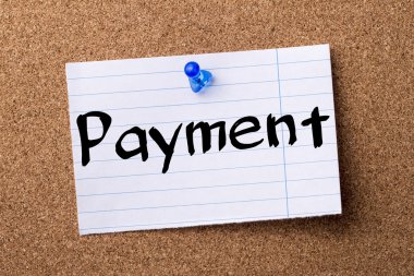 Ödeme - kalçası not kağıdı bulletin board tutturulmuş.