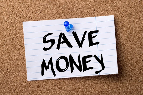 SAVE MONEY - teared note paper pinned on bulletin board — Stock Photo, Image
